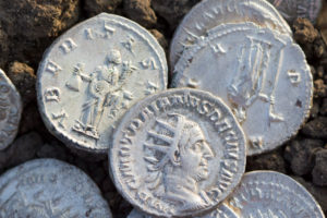 Ancient Roman silver coin showing the portrait of the emperor Ancient Roman silver coin showing the portrait of the emperor